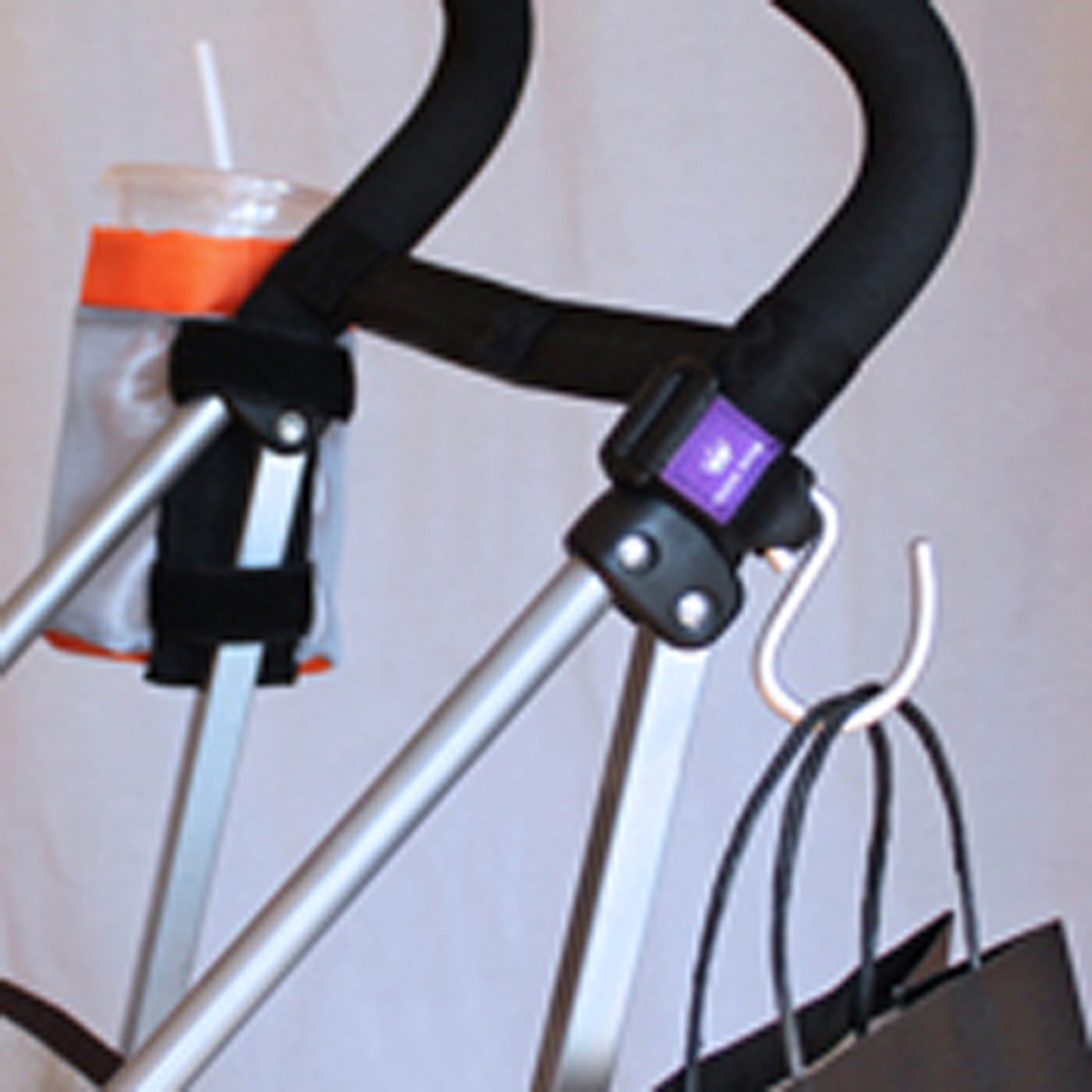 Think King mighty buggy hook and soft buggy cup on McClaren umbrella stroller