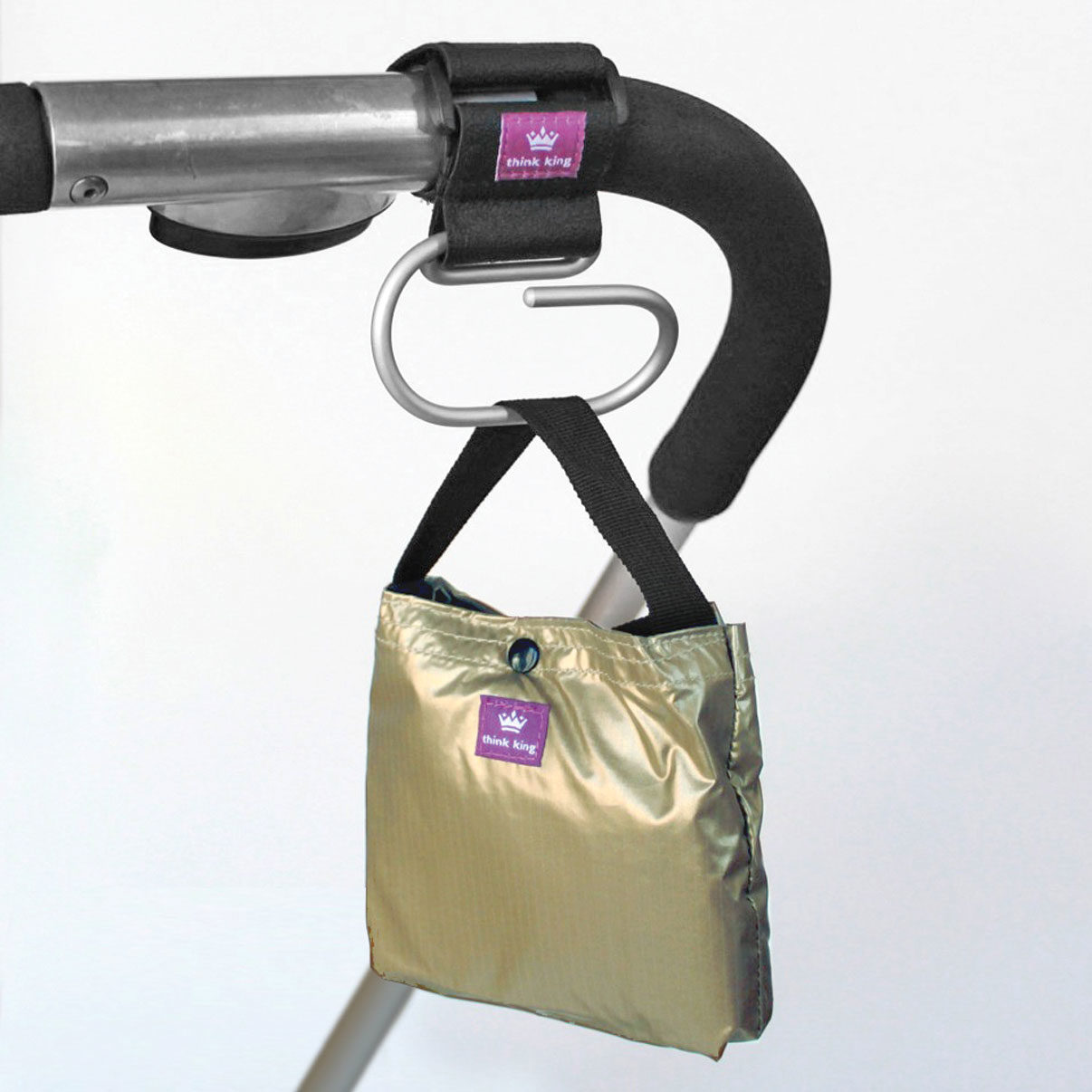 Gold Metallic Think King Reusable Tote Bag hanging from Jumbo Sirly Hook on stroller bar